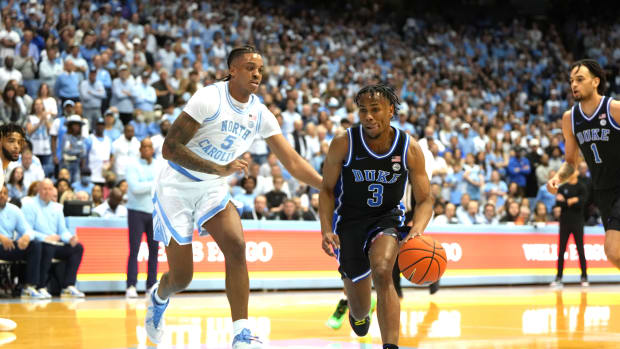 Duke Blue Devils guard Jeremy Roach dribbles past North Carolina Tar Heels forward Armando Bacot.
